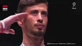 احترام نظامی «عرفان محرمی» در مراسم اهدای مدال طلای ووشو کشور های اسلامی