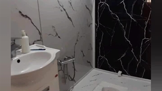 نصب ماربل شیت در حمام و سرویس