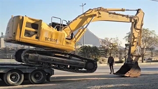 بیل میکانیکی از روی کمرشکن با چی پایین میارن؟